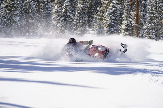 Snowmobiling Wyoming powder.